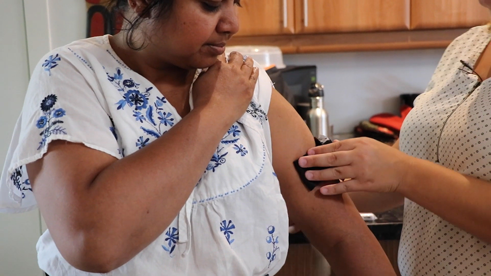 A researcher places a biometric device on a service provider