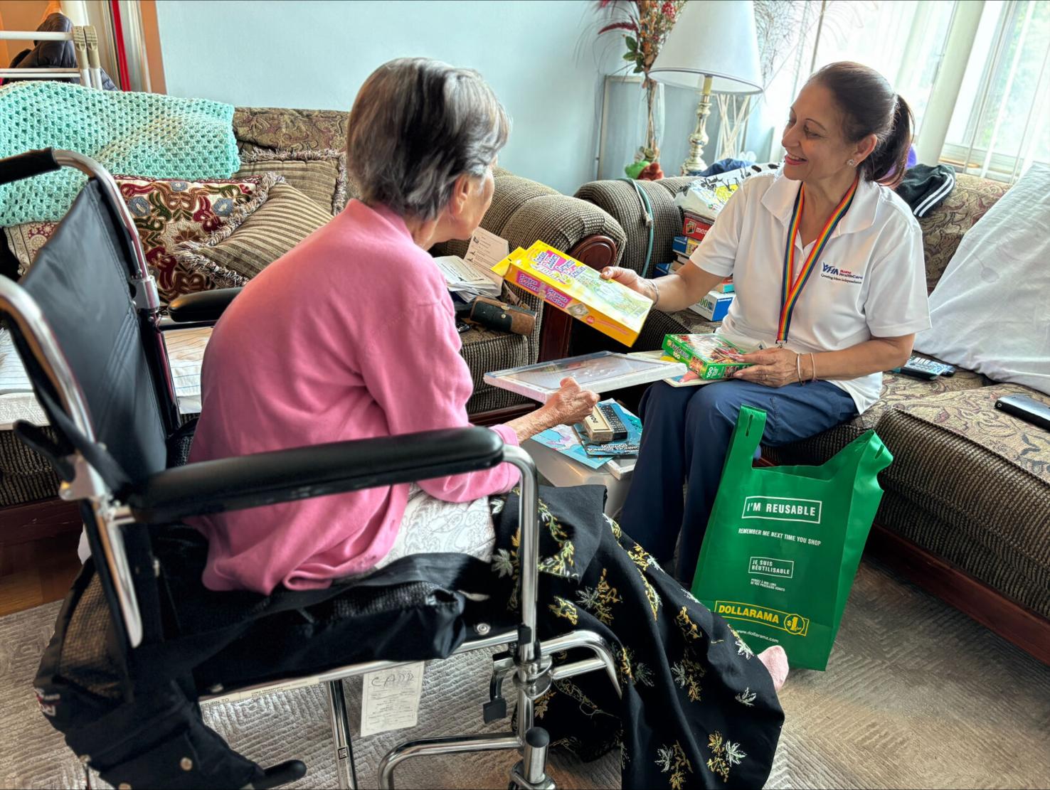 Personal Support Worker with client in wheelchair